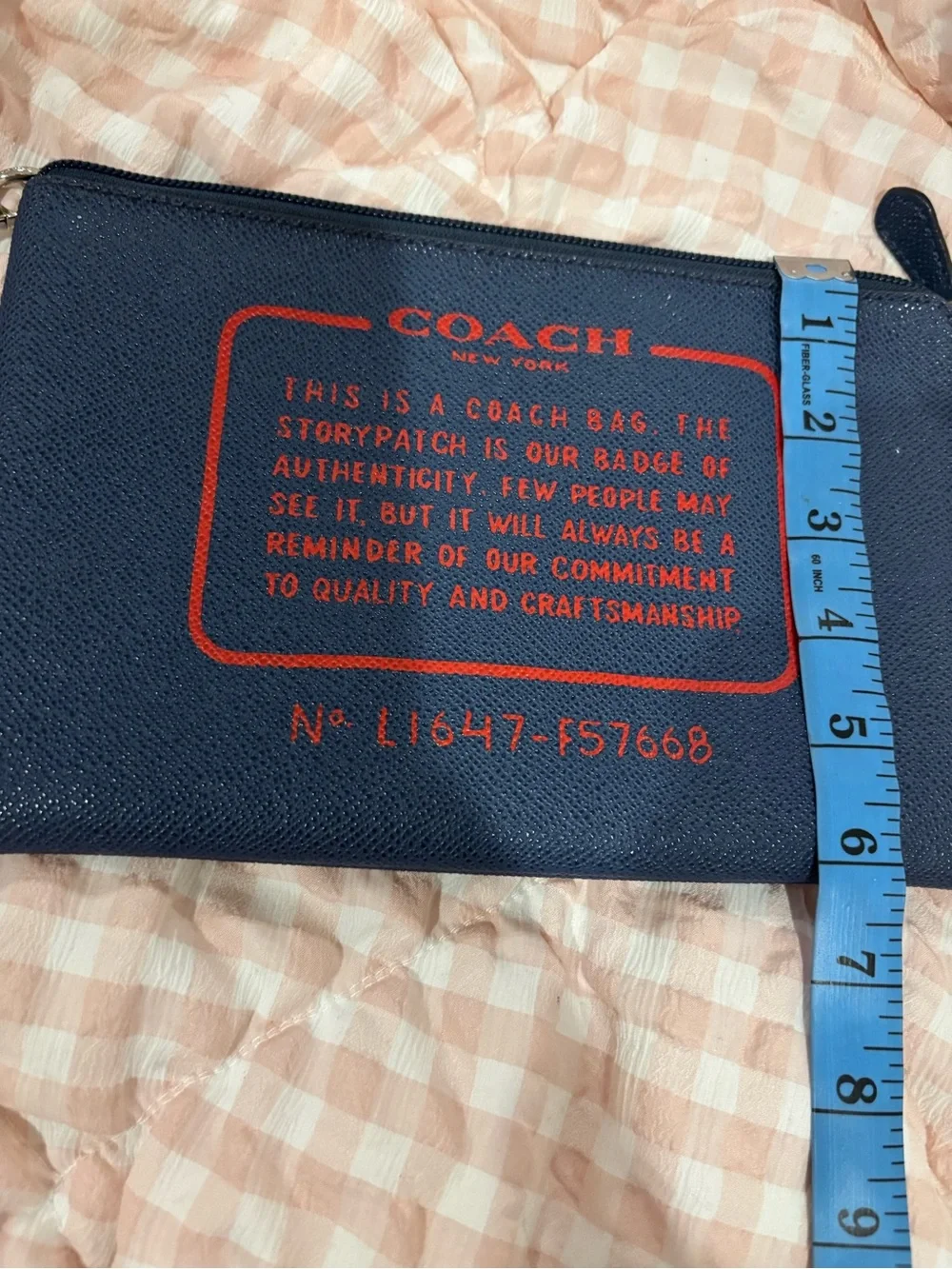 Coach Navy Wristlet with Red Logo Print